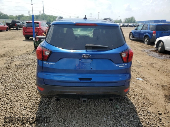 2019 Ford Escape Titanium z VIN 1FMCU9J99KUB39487, wystawiony jako Copart lot #60424765 z przebiegiem 43 094 mil mil oraz Szkoda całkowita • Salvage title. Historia ofert i sprzedaży dostępna na DreamBid. Obrazek 6.