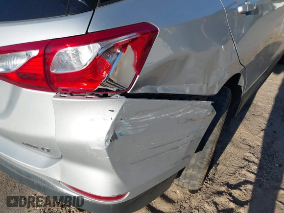 2020 Chevrolet Equinox LT with VIN 2GNAXUEV7L6111580, listed as a IAAI auction lot 41830060 with 96,968 mi miles and . Bid and sale history available at DreamBid. Image 17.