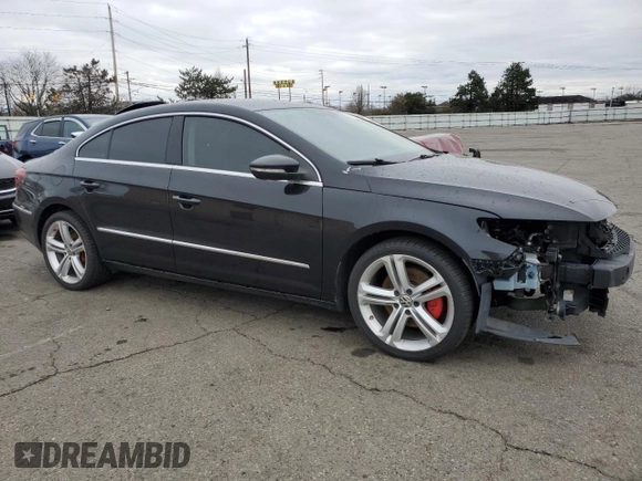 2013 Volkswagen CC Sport with VIN WVWBP7AN6DE509025, listed as a Copart auction lot 49746235 with 153,095 mi miles and Salvage Title. Bid and sale history available at carsss.com. Image 4.