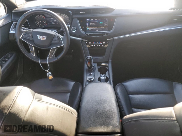 2022 Cadillac XT5 FWD Luxury z VIN 1GYKNAR49NZ159814, wystawiony jako Copart lot #74506584 z przebiegiem 7 069 mil mil oraz Nie do naprawy • Non repairable. Historia ofert i sprzedaży dostępna na DreamBid. Obrazek 8.