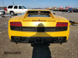 2014 Lamborghini Gallardo z VIN ZHWGU5BZ7ELA13923, wystawiony jako Copart lot #82374714 z przebiegiem 33 260 mil mil oraz Szkoda całkowita • Salvage title. Historia ofert i sprzedaży dostępna na DreamBid. Obrazek 6.