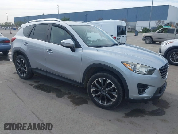 2016 Mazda CX-5 Grand Touring with VIN JM3KE2DY9G0723921, listed as a IAAI auction lot 41681522 with 83,893 mi miles. Bid and sale history available at carsss.com. Image 1.