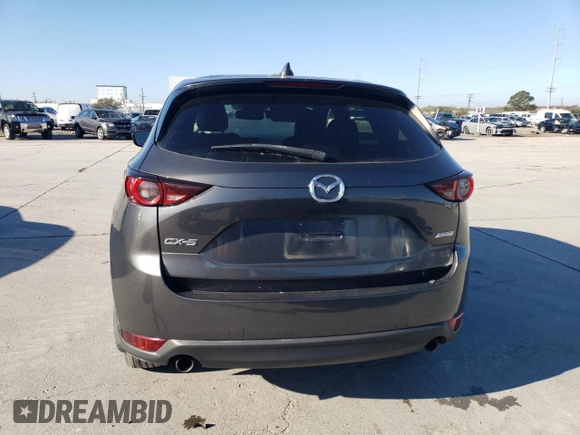 2017 Mazda CX-5 Touring with VIN JM3KFACL7H0217194, listed as a Copart auction lot 46545345 with 80,269 mi miles and Salvage Title. Bid and sale history available at carsss.com. Image 6.