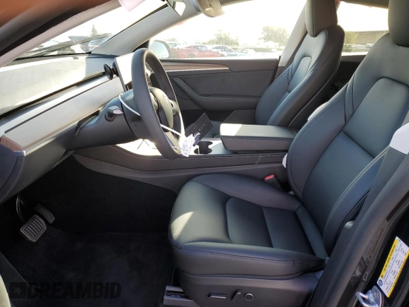 2025 Tesla Model Y Long Range with VIN 7SAYGDEE4SF272942, listed as a Copart auction lot 45817885 with 2,308 mi miles and Salvage Title. Bid and sale history available at DreamBid. Image 7.