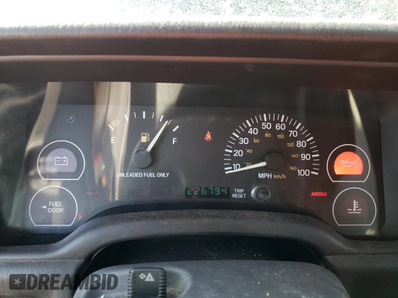 1999 Jeep Cherokee SE with VIN 1J4FF28S3XL551875, listed as a Copart auction lot 43057555 with 226,794 mi miles and Salvage title. Bid and sale history available at DreamBid. Image 9.