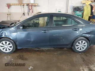 2016 Toyota Corolla L z VIN 5YFBURHE1GP441833, wystawiony jako IAAI lot #41857006 z przebiegiem 179 899 mil mil oraz . Historia ofert i sprzedaży dostępna na DreamBid. Obrazek 14.