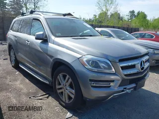 2014 Mercedes-Benz GL 450 with VIN 4JGDF7CE0EA290673, listed as a IAAI auction lot 42207889 with 132,251 mi miles and . Bid and sale history available at DreamBid. Image 1.