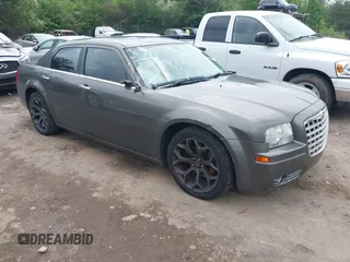 2010 Chrysler 300 Touring with VIN 2C3CA4CD2AH224291, listed as a IAAI auction lot 42123591 with 207,818 mi miles and . Bid and sale history available at DreamBid. Image 1.