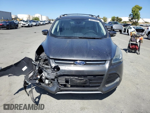 2015 Ford Escape Titanium with VIN 1FMCU9J99FUC13108, listed as a Copart auction lot 60815265 with 70,938 mi miles and Salvage title. Bid and sale history available at DreamBid. Image 5.