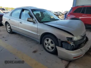1997 Honda Accord Special Edition z VIN 1HGCD5603VA135630, wystawiony jako Copart lot #57807945 z przebiegiem 202 533 mil mil oraz Szkoda całkowita • Salvage title. Historia ofert i sprzedaży dostępna na DreamBid. Obrazek 4.