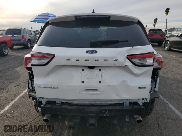 2022 Ford Escape Titanium Plug-In Hybrid с VIN 1FMCU0LZ8NUB45858, выставлен на аукционе Copart как лот 84727544 с пробегом 8 612 миль миль и Списание • Salvage title. История ставок и продаж доступна на DreamBid. Изображение 6.