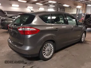 2013 Ford C-Max SEL z VIN 1FADP5BU9DL531704, wystawiony jako IAAI lot #42228841 z przebiegiem 91 808 mil mil oraz . Historia ofert i sprzedaży dostępna na DreamBid. Obrazek 4.