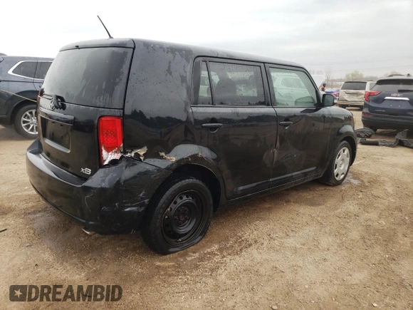 2009 Scion xB with VIN JTLKE50E491063990, listed as a Copart auction lot 53448265 with 152,420 mi miles and Salvage Title. Bid and sale history available at DreamBid. Image 3.