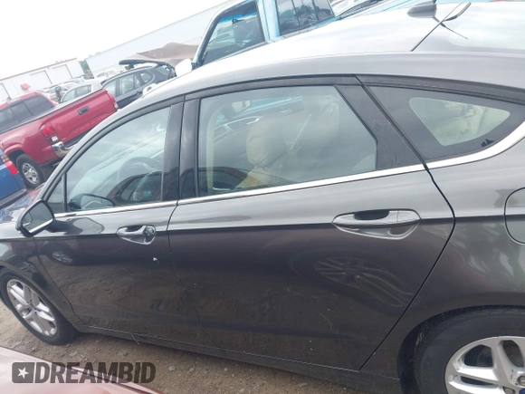 2016 Ford Fusion SE with VIN 3FA6P0H73GR218876, listed as a IAAI auction lot 42797357 with 250,997 mi miles and . Bid and sale history available at DreamBid. Image 14.