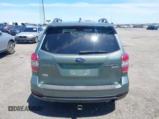 2016 Subaru Forester Touring with VIN JF2SJAVCXGH490507, listed as a IAAI auction lot 42070715 with 98,456 mi miles and . Bid and sale history available at DreamBid. Image 16.