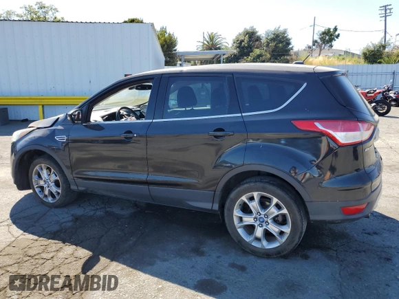 2013 Ford Escape SEL with VIN 1FMCU9H94DUC94456, listed as a Copart auction lot 63872645 with 177,099 mi miles and Salvage title. Bid and sale history available at DreamBid. Image 2.