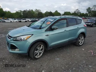 2013 Ford Escape Titanium z VIN 1FMCU0J92DUA51900, wystawiony jako Copart lot #54594015 z przebiegiem 112 248 mil mil oraz Tytuł czysty. Historia ofert i sprzedaży dostępna na DreamBid. Obrazek 1.