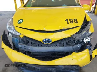 2016 Toyota Prius v Two with VIN JTDZN3EUXGJ055176, listed as a IAAI auction lot 42047651 with 282,741 mi miles. Bid and sale history available at carsss.com. Image 6.