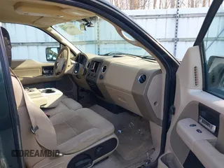 2005 Ford F-150 XLT with VIN 1FTPX14505FB72622, listed as a IAAI auction lot 41823532 with 165,918 mi miles. Bid and sale history available at carsss.com. Image 5.