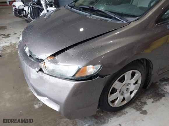 2011 Honda Civic Sdn LX with VIN 19XFA1F58BE034665, listed as a IAAI auction lot 41552809 with 170,852 mi miles. Bid and sale history available at carsss.com. Image 19.
