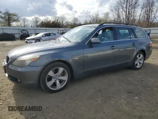 2007 BMW 5 Series 530xi with VIN WBANN735X7CN04083, listed as a Copart auction lot 50702085 with 194,728 mi miles and Salvage title. Bid and sale history available at DreamBid. Image 1.