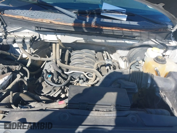 2014 Ford F-150 XL with VIN 1FTFX1CF5EKG23962, listed as a IAAI auction lot 41453430 with 184,837 mi miles. Bid and sale history available at carsss.com. Image 10.