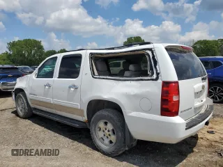 2011 Chevrolet Suburban LT with VIN 1GNSKJE35BR394032, listed as a Copart auction lot 59235184 with 248,979 mi miles and Salvage Title. Bid and sale history available at carsss.com. Image 2.