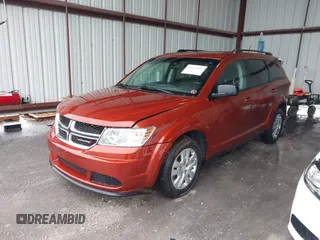 2014 Dodge Journey SE with VIN 3C4PDCAB1ET227003, listed as a IAAI auction lot 42143105 with 212,334 mi miles. Bid and sale history available at carsss.com. Image 2.