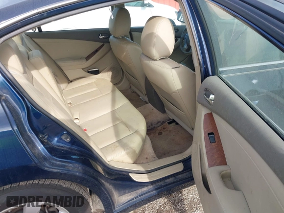 2009 Nissan Altima 2.5 S with VIN 1N4AL21E79C126309, listed as a IAAI auction lot 42095416 with 127,254 mi miles. Bid and sale history available at carsss.com. Image 8.