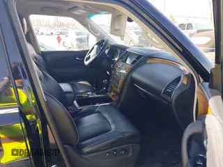 2012 Infiniti QX56 7-passenger z VIN JN8AZ2NE1C9017100, wystawiony jako IAAI lot #41654025 z przebiegiem 184 849 mil mil oraz . Historia ofert i sprzedaży dostępna na DreamBid. Obrazek 5.