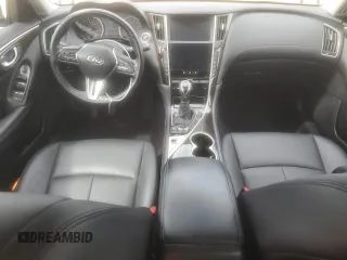 2019 Infiniti Q50 Luxe with VIN JN1EV7AP6KM517944, listed as a Copart auction lot 56942655 with 94,883 mi miles and Salvage title. Bid and sale history available at DreamBid. Image 8.
