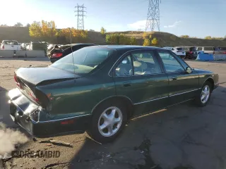 1996 Oldsmobile LSS z VIN 1G3HY52K1T4801881, wystawiony jako Copart lot #75327304 z przebiegiem 123 374 mil mil oraz Szkody całkowita. Historia ofert i sprzedaży dostępna na DreamBid. Obrazek 3.