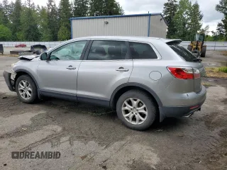 2011 Mazda CX-9 Touring with VIN JM3TB3CV7B0326839, listed as a Copart auction lot 57061345 with 111,832 mi miles and Salvage title. Bid and sale history available at DreamBid. Image 2.