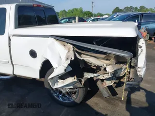 2000 Ford F-150 XL with VIN 1FTRX17L7YNB73649, listed as a IAAI auction lot 42159021 with Not provided miles and . Bid and sale history available at DreamBid. Image 6.