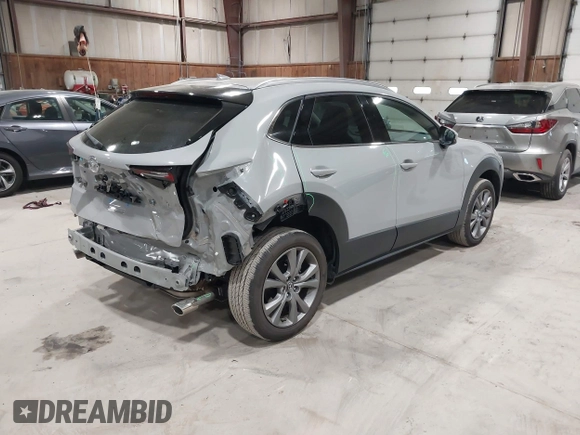2025 Mazda CX-30 S Premium with VIN 3MVDMBDM5SM788786, listed as a IAAI auction lot 42126428 with 1,370 mi miles and . Bid and sale history available at DreamBid. Image 4.