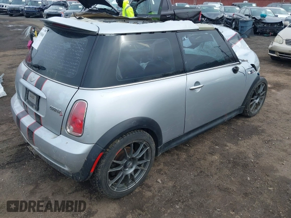 2006 MINI Hardtop S with VIN WMWRE33546TL23876, listed as a IAAI auction lot 41858060 with 146,359 mi miles and . Bid and sale history available at DreamBid. Image 4.