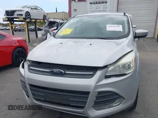 2015 Ford Escape SE with VIN 1FMCU0G95FUC81490, listed as a IAAI auction lot 42136791 with 140,967 mi miles. Bid and sale history available at carsss.com. Image 12.