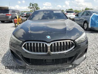 2020 BMW 8 Series M850i z VIN WBAGV8C06LBP48901, wystawiony jako Copart lot #57595725 z przebiegiem 88 332 mil mil oraz Tytuł czysty. Historia ofert i sprzedaży dostępna na DreamBid. Obrazek 5.