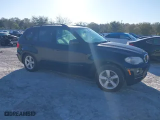 2007 BMW X5 3.0si with VIN 5UXFE43587L018974, listed as a IAAI auction lot 41842712 with 1 mi miles. Bid and sale history available at carsss.com. Image 1.