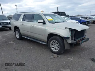 2015 GMC Yukon XL SLT with VIN 1GKS2HKC7FR100534, listed as a IAAI auction lot 41229658 with 207,947 mi miles. Bid and sale history available at carsss.com. Image 1.
