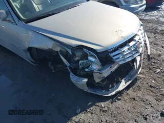 2008 Cadillac DTS 1SC z VIN 1G6KD57Y38U198313, wystawiony jako IAAI lot #42012714 z przebiegiem Nie podano mil oraz . Historia ofert i sprzedaży dostępna na DreamBid. Obrazek 6.