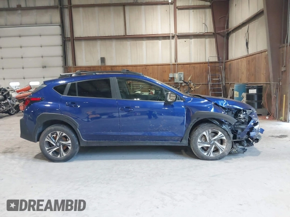 2024 Subaru Crosstrek Premium z VIN JF2GUADC3R8318644, wystawiony jako IAAI lot #42558586 z przebiegiem 33 648 mil mil oraz . Historia ofert i sprzedaży dostępna na DreamBid. Obrazek 13.