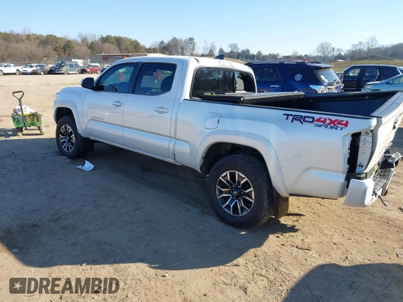 2021 Toyota Tacoma 4WD SR5 with VIN 3TYDZ5BN3MT001860, listed as a IAAI auction lot 41269423 with 23,378 mi miles. Bid and sale history available at carsss.com. Image 3.