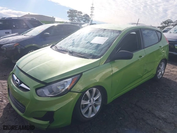 2012 Hyundai Accent SE with VIN KMHCU5AE2CU026701, listed as a IAAI auction lot 41303728 with 66,855 mi miles. Bid and sale history available at carsss.com. Image 6.