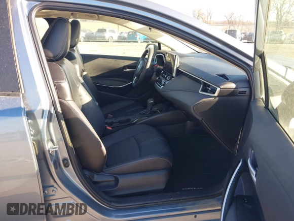 2023 Toyota Corolla Hybrid LE with VIN JTDBCMFEXPJ014034, listed as a IAAI auction lot 41865829 with 33,210 mi miles and . Bid and sale history available at carsss.com. Image 5.