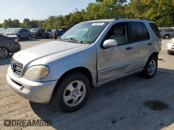 2002 Mercedes-Benz M-Class with VIN 4JGAB54E52A337189, listed as a Copart auction lot 71348154 with 220,378 mi miles and Salvage Title. Bid and sale history available at carsss.com. Image 1.