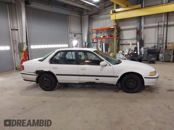 1993 Honda Accord z VIN 1HGCB7651PA022436, wystawiony jako IAAI lot #41785092 z przebiegiem Nie podano mil oraz . Historia ofert i sprzedaży dostępna na DreamBid. Obrazek 13.