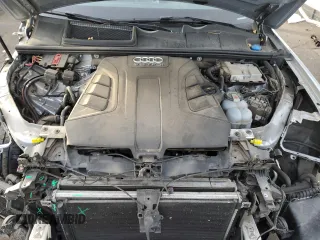 2018 Audi Q7 Premium z VIN WA1AAAF71JD017762, wystawiony jako Copart lot #81324904 z przebiegiem 79 688 mil mil oraz Szkoda całkowita • Salvage title. Historia ofert i sprzedaży dostępna na DreamBid. Obrazek 11.