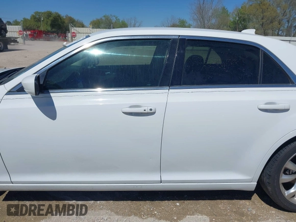 2016 Chrysler 300 Anniversary Edition with VIN 2C3CCAAG7GH313739, listed as a IAAI auction lot 41833824 with 285,806 mi miles and . Bid and sale history available at DreamBid. Image 15.