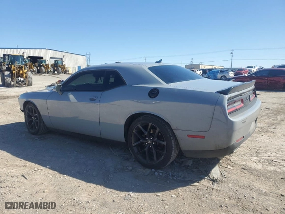 2021 Dodge Challenger GT with VIN 2C3CDZJG4MH674188, listed as a Copart auction lot 48475945 with 69,912 mi miles and Salvage Title. Bid and sale history available at carsss.com. Image 2.